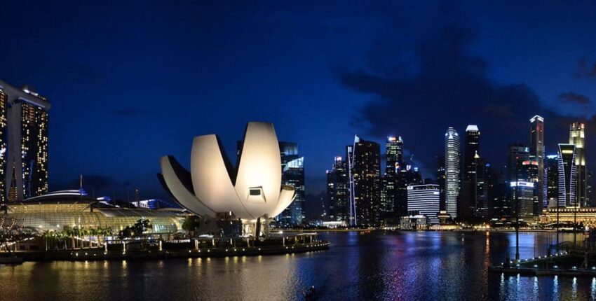 Emplacement de jet privé : Skyline de Singapour avec Marina Bay Sands.