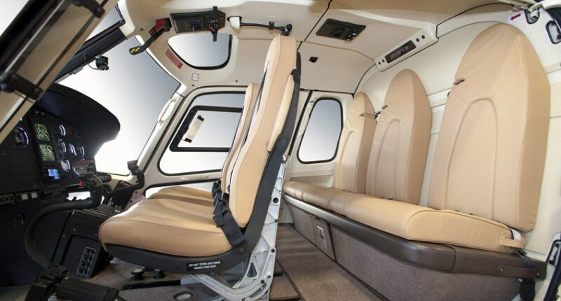 location hélicoptère - intérieur H125 avec sièges en cuir beige