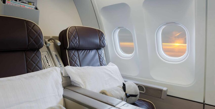 <b>location de jet privé</b> - Coucher de soleil à travers hublots Airbus A340.